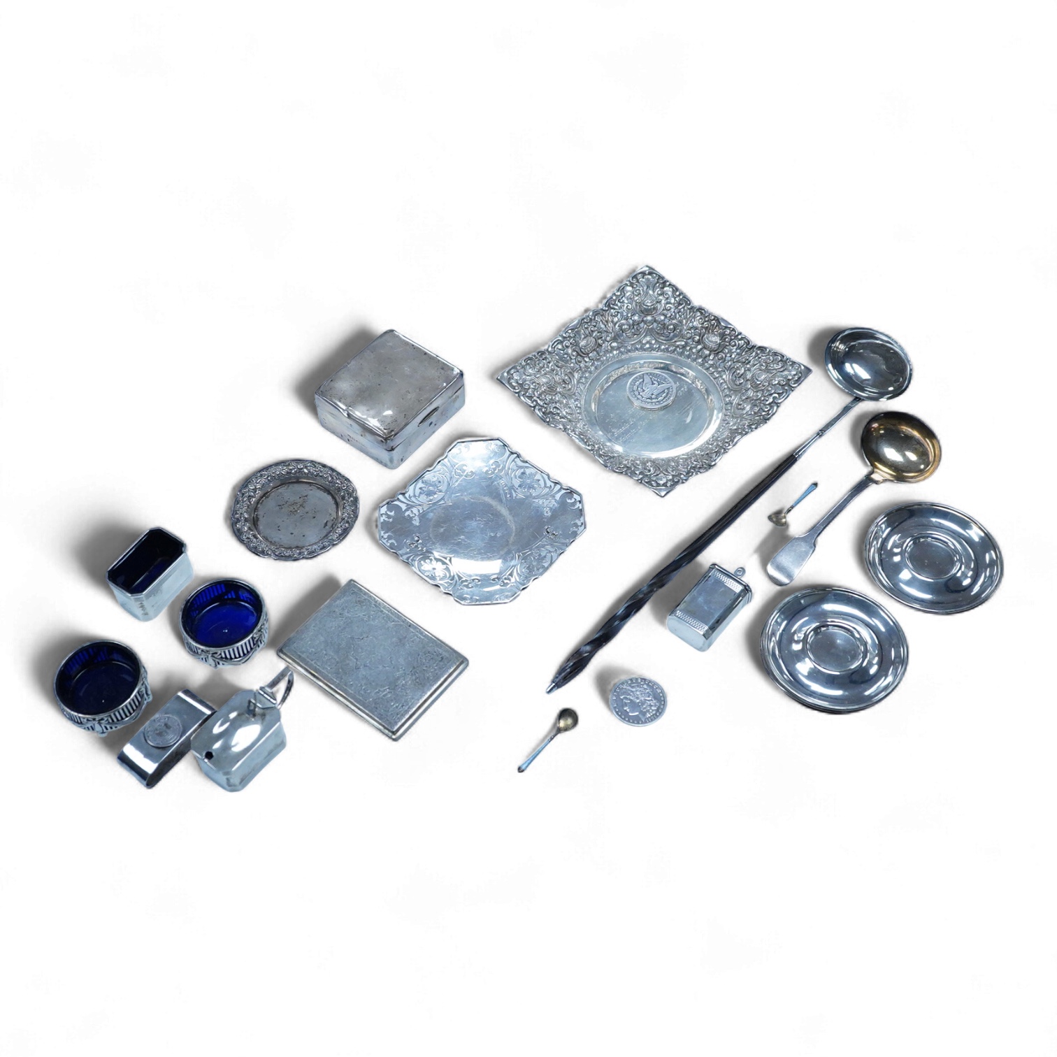 A small group of silver to include an Elizabeth II pierced shallow dish by Viners Ltd, Sheffield, 1957, diameter 12.4cm, a 1930's silver mounted cigarette box, a George III silver fiddle pattern sauce ladle and five silv